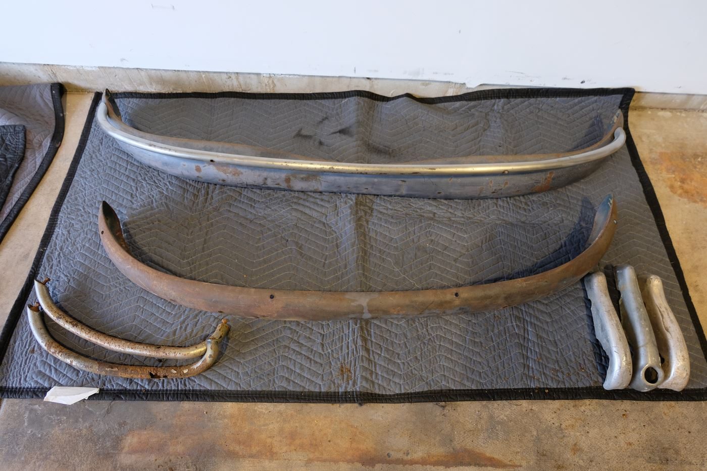 Front bumper and horn grille, removed and stored