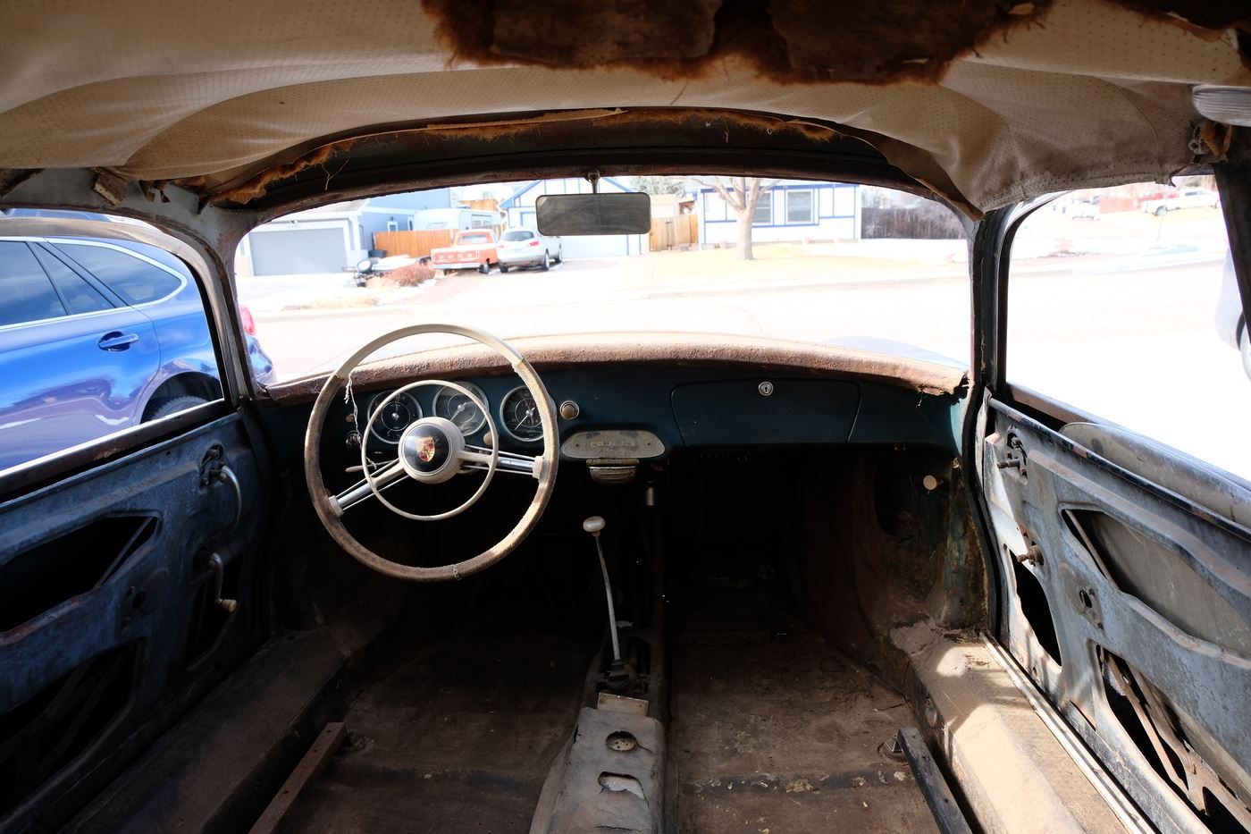 Cabin as found, driver's door open, dashboard removed