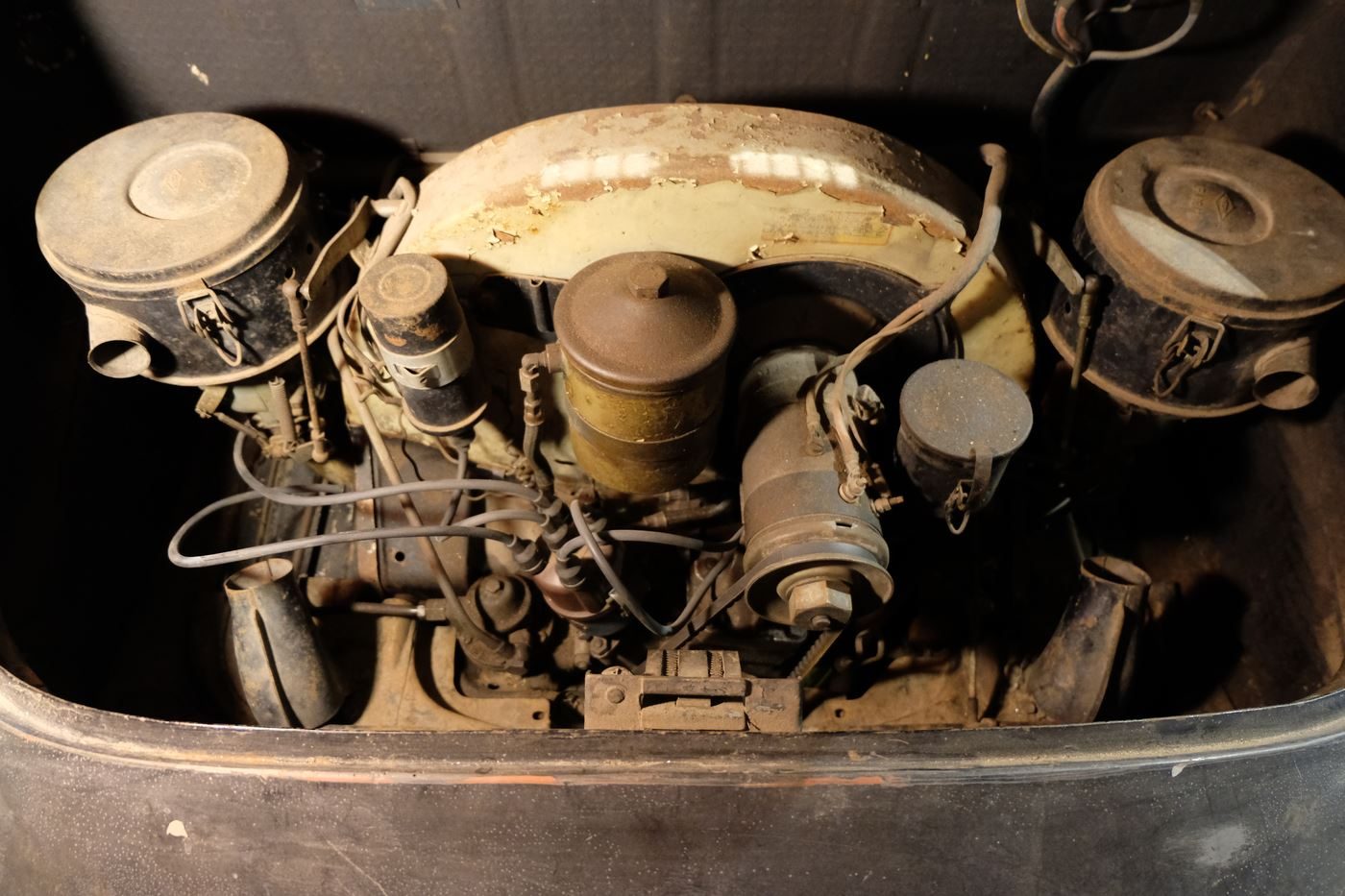 Engine bay, drivetrain partially removed