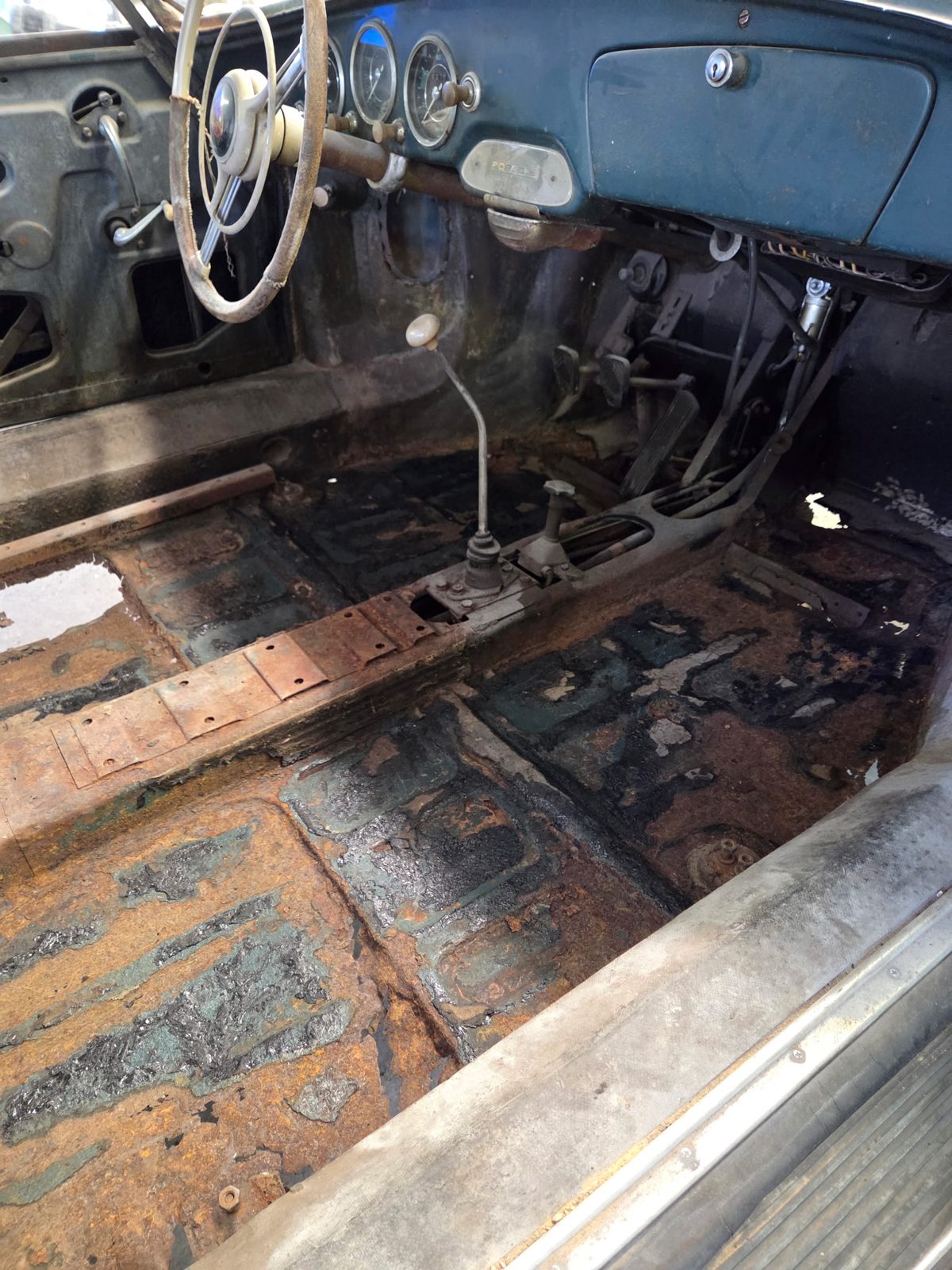 Original floor as found, surface rust throughout