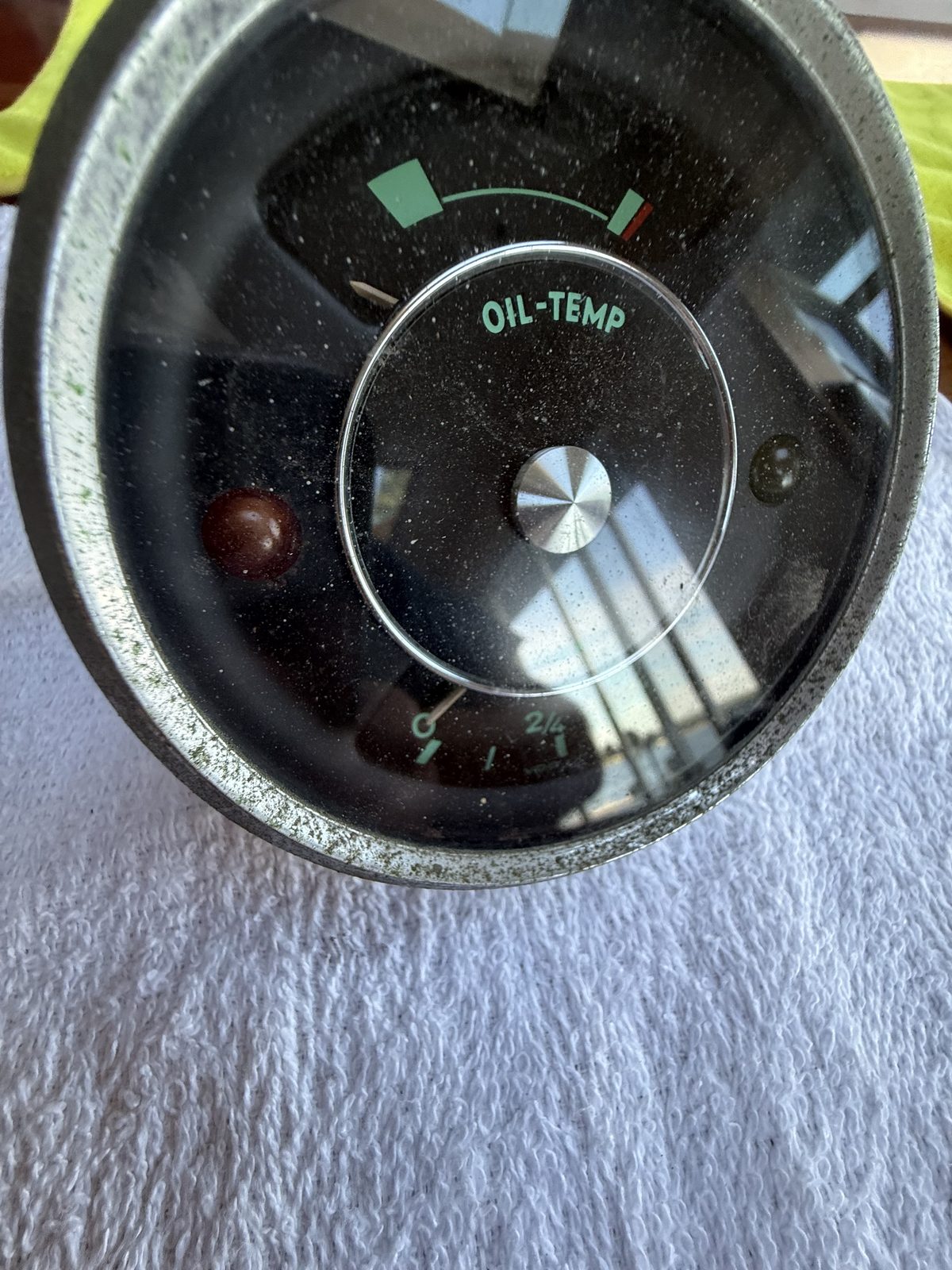 Gauge face seen through the pitted original glass