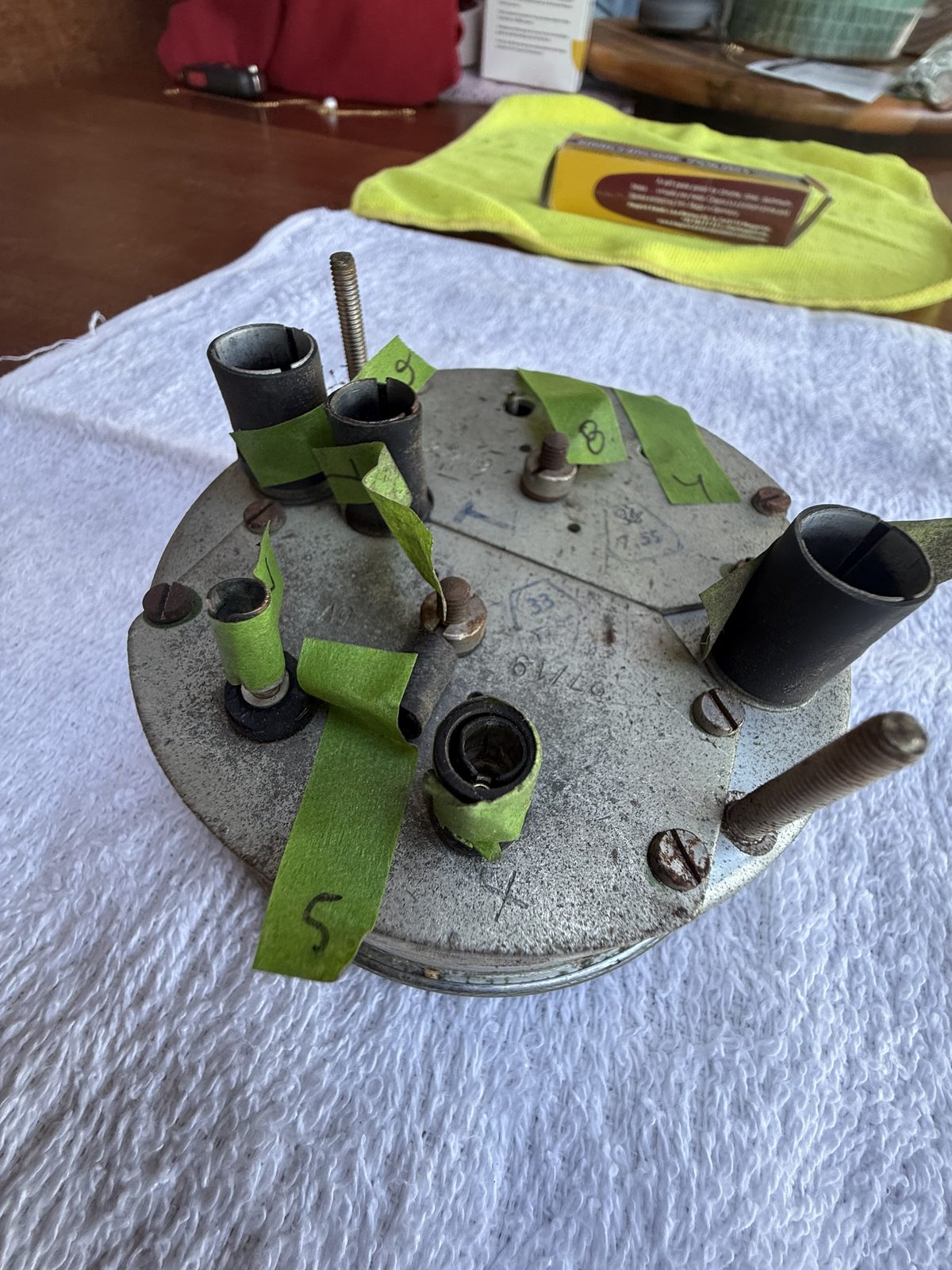Rear of the combination gauge showing terminals with numbered tape still attached